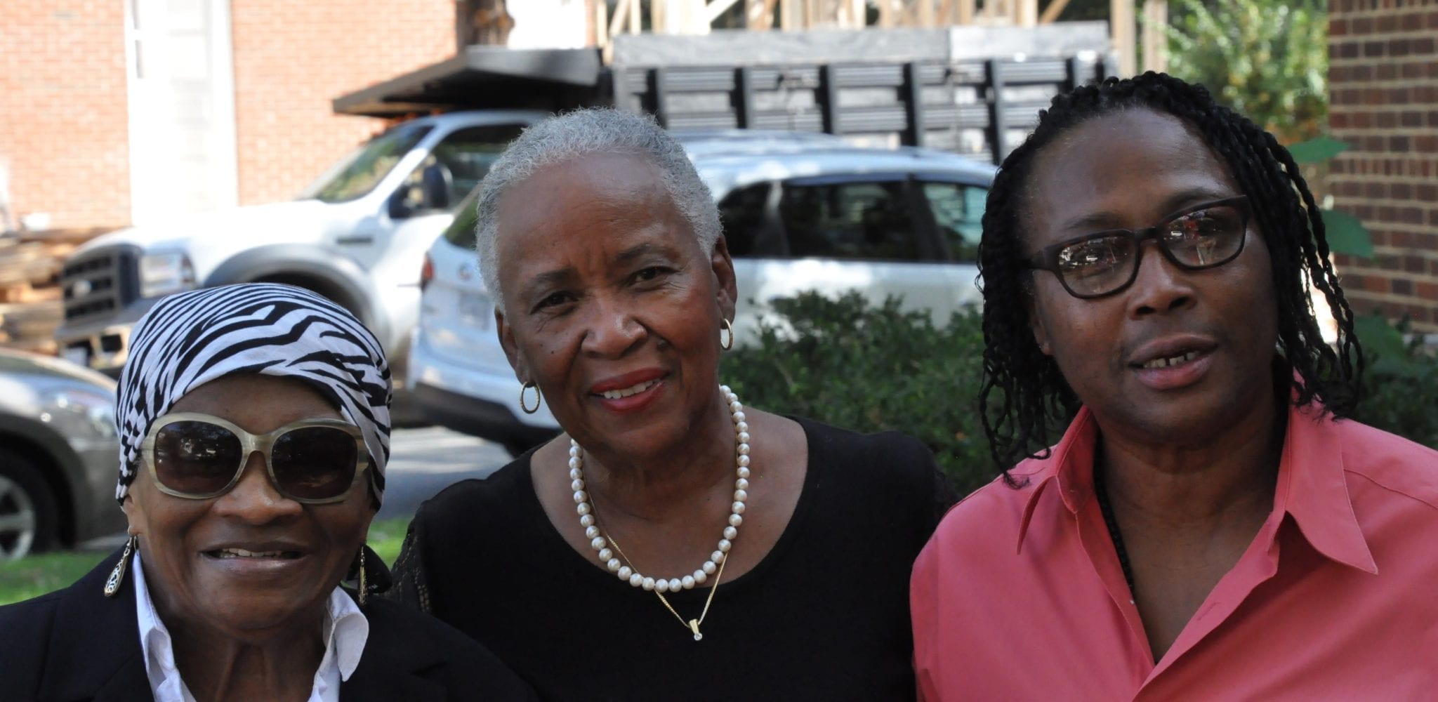 outdoor portrait of three people